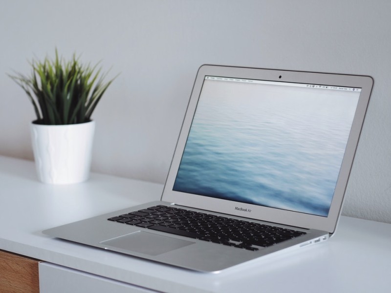 An open laptop on a desk.